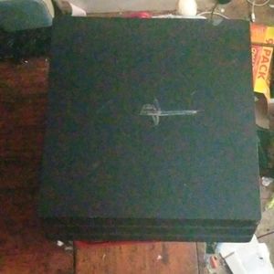 Play Station 4 with 1 TB hard drive.